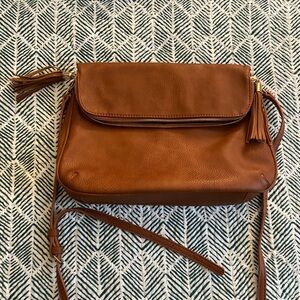NWOT Camel color boho cross body tassel purse.